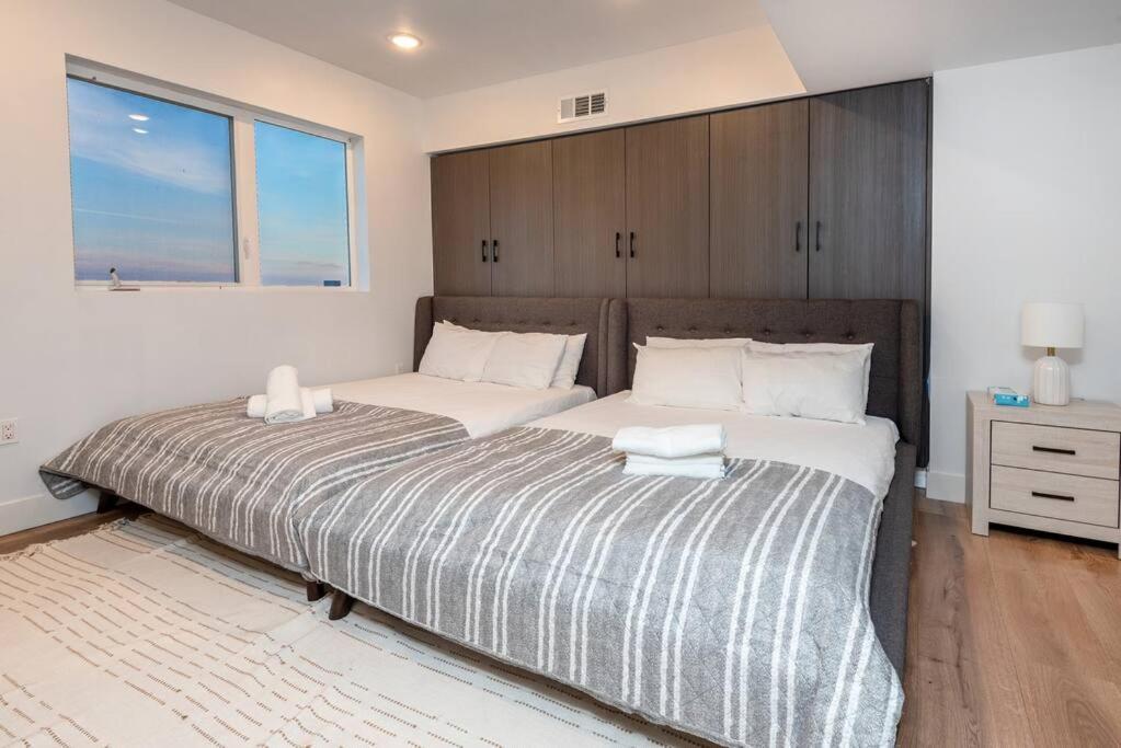 Chic And Elegant 2-bedroom Haven W/ Roof Deck Hébergement de vacances
